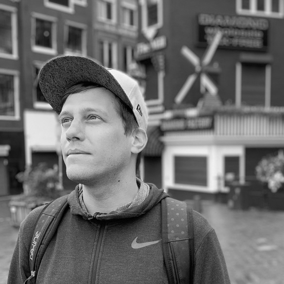 Julian Anthes wearing a baseball cap